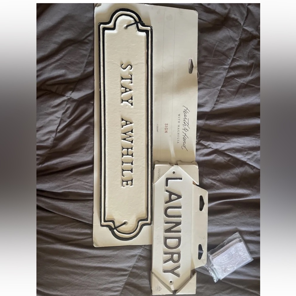 Stay awhile and Laundry signs
